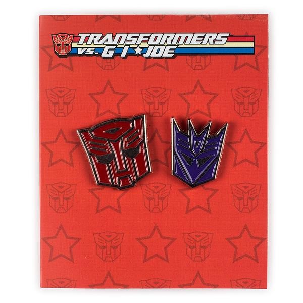 Transformers News: Final Product Images of KidRobot Transformers vs GI Joe Vinyl Figures, Enamel Pins and More Transformers News: Final Product Images of KidRobot Transformers vs GI Joe Vinyl Figures, Enamel Pins and More