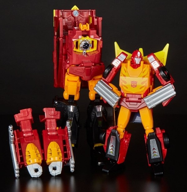 Transformers News: In-Hand Images of Transformers Power of the Primes Leader Rodimus and Optimus Prime Mid-Evolution
