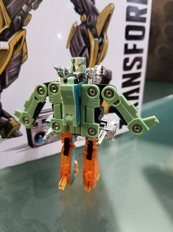 Transformers News: In-Hand Images of #HasbroSDCC Exclusive Dairu & Uruaz Dino Cassettes