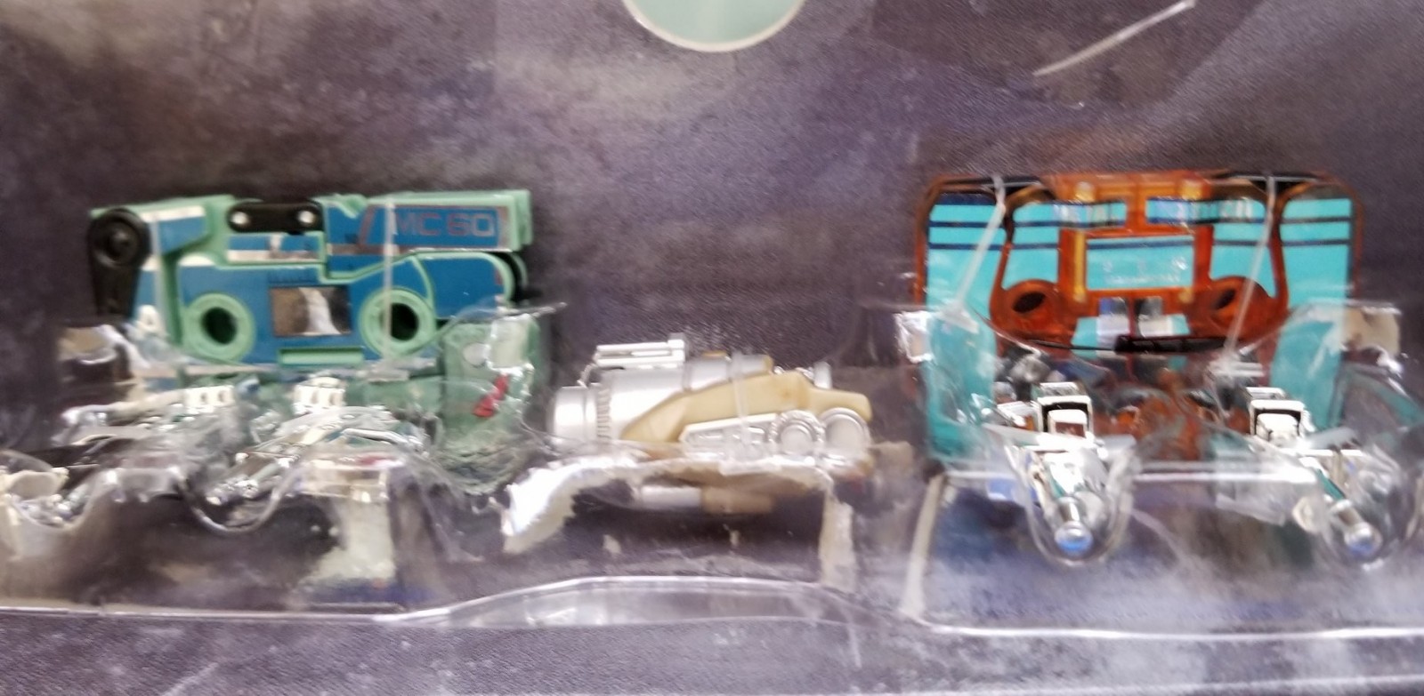 Transformers News: In-Hand Images of #HasbroSDCC Exclusive Dairu & Uruaz Dino Cassettes