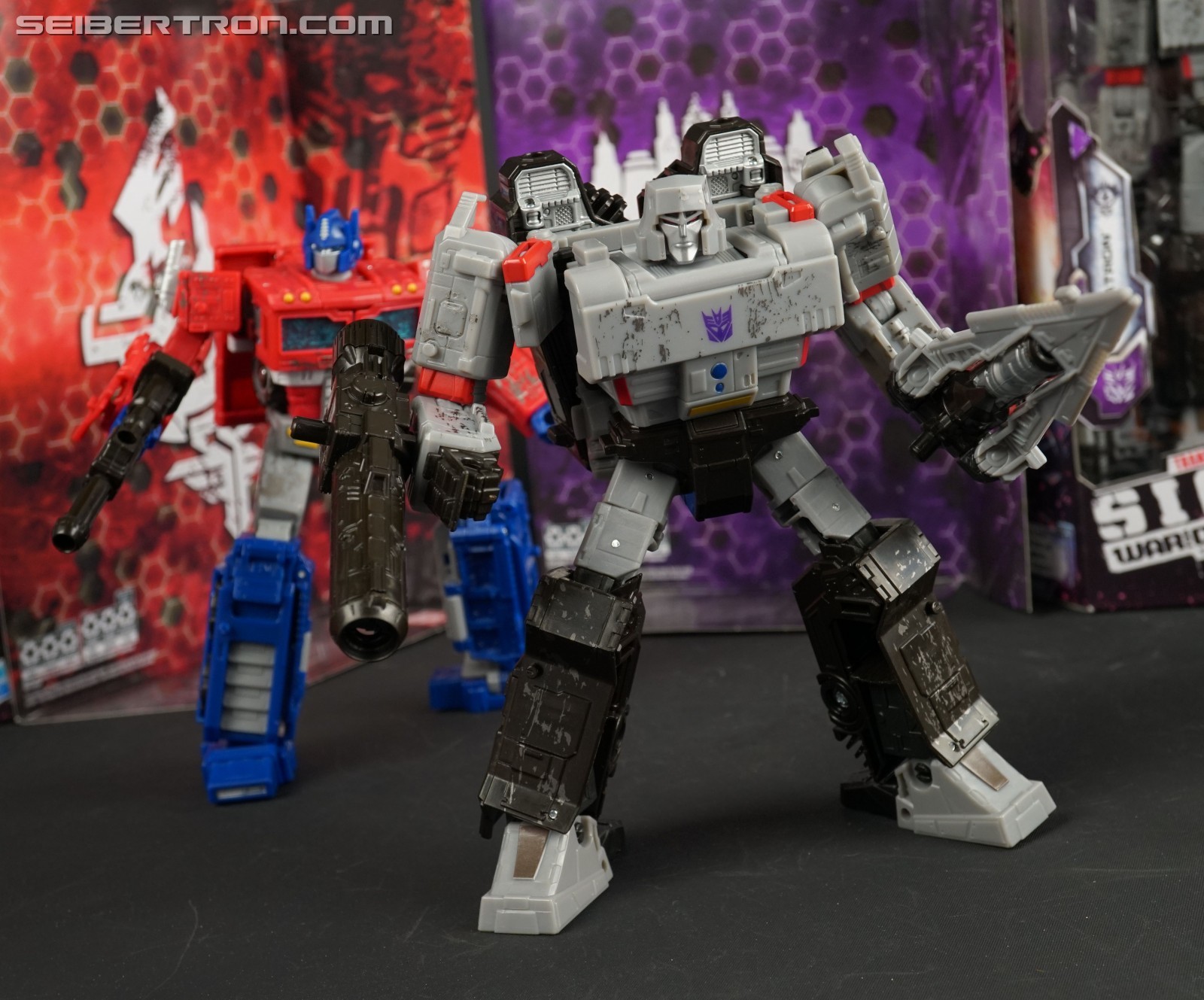 Transformers News: In Hand Images of Transformers WFC Siege Optimus Prime and Megatron Transformers News: In Hand Images of Transformers WFC Siege Optimus Prime and Megatron