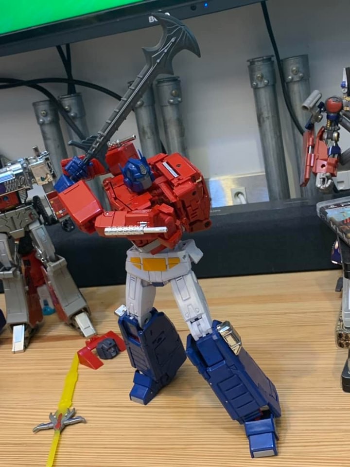 Transformers News: Transformers MP44 Optimus Prime In Hand Images Showing Accessories, Articulation, Collector Pin Transformers News: Transformers MP44 Optimus Prime In Hand Images Showing Accessories, Articulation, Collector Pin