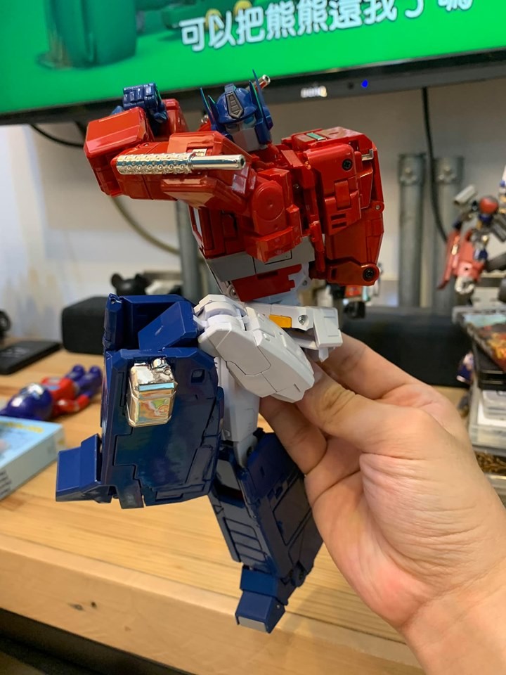 Transformers News: Transformers MP44 Optimus Prime In Hand Images Showing Accessories, Articulation, Collector Pin Transformers News: Transformers MP44 Optimus Prime In Hand Images Showing Accessories, Articulation, Collector Pin
