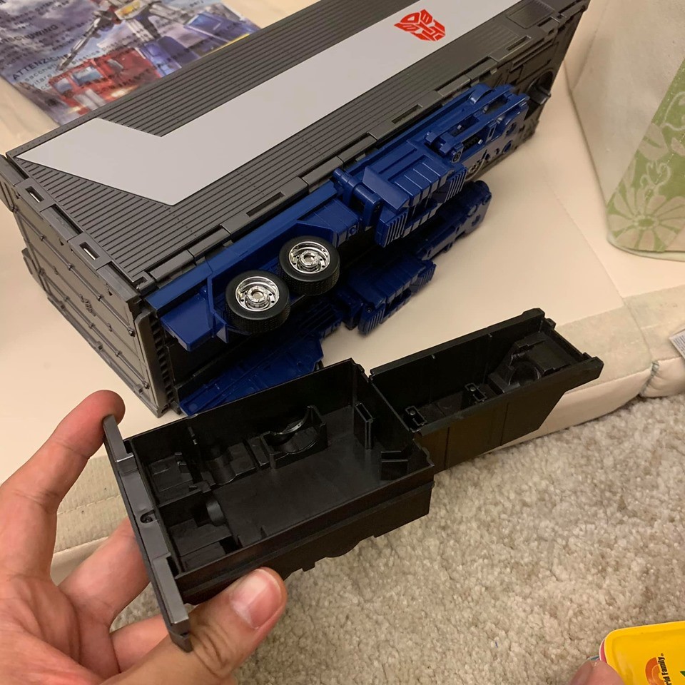 Transformers News: Transformers MP44 Optimus Prime In Hand Images Showing Accessories, Articulation, Collector Pin Transformers News: Transformers MP44 Optimus Prime In Hand Images Showing Accessories, Articulation, Collector Pin