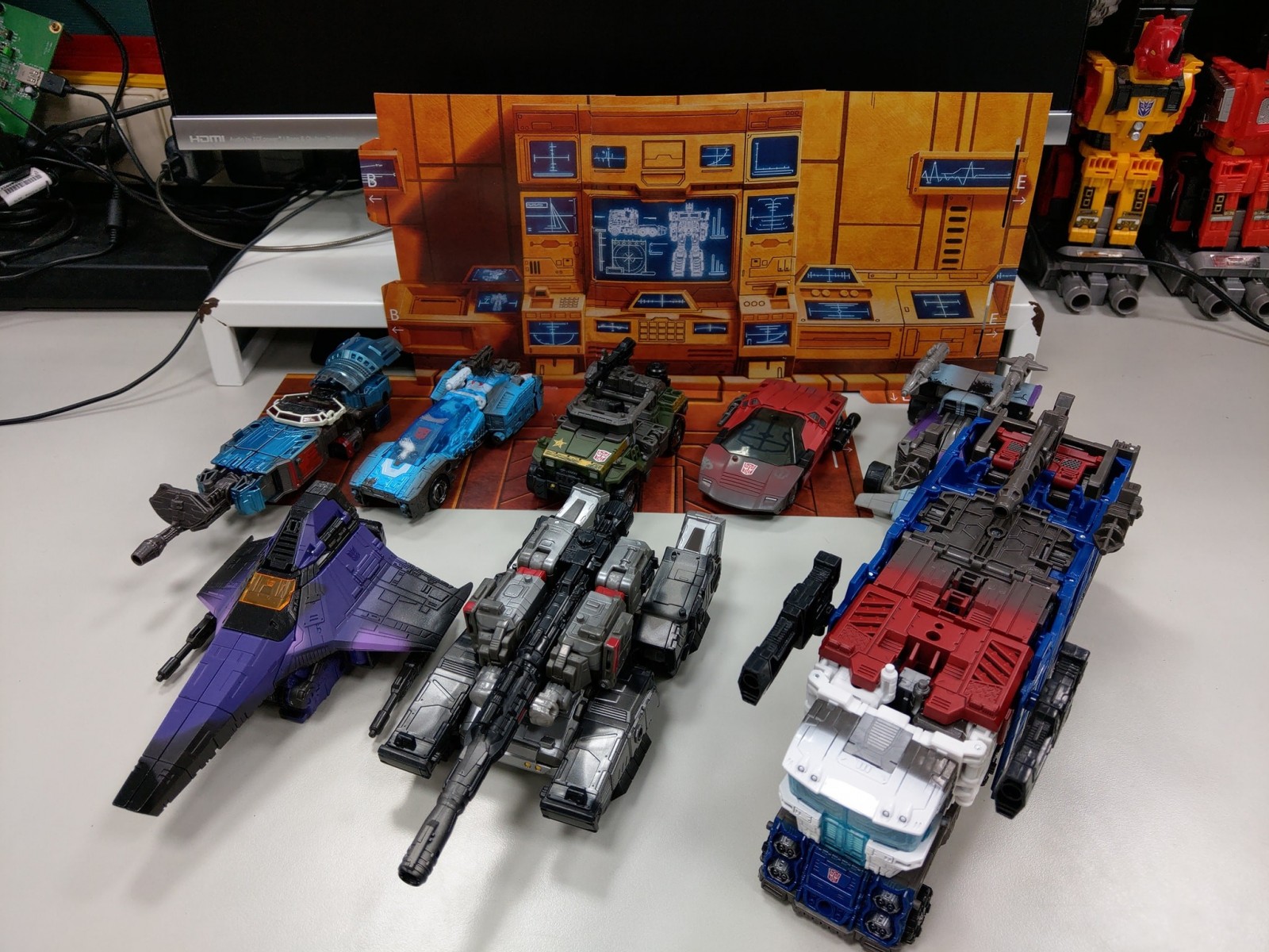 Transformers News: In hand Images of Netflix Deluxe Figures Shows Scrapface in Camera Mode