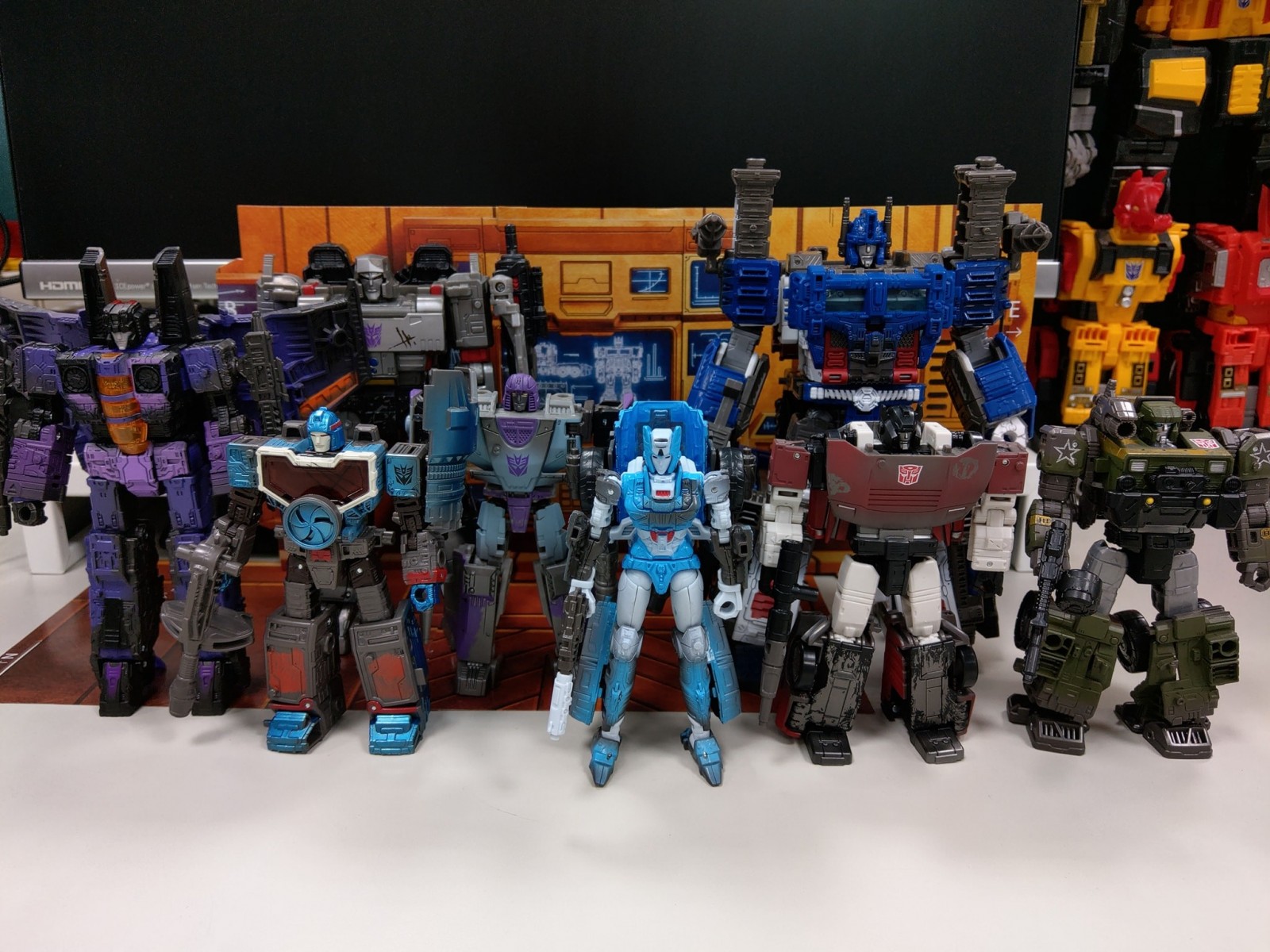 Transformers News: In hand Images of Netflix Deluxe Figures Shows Scrapface in Camera Mode