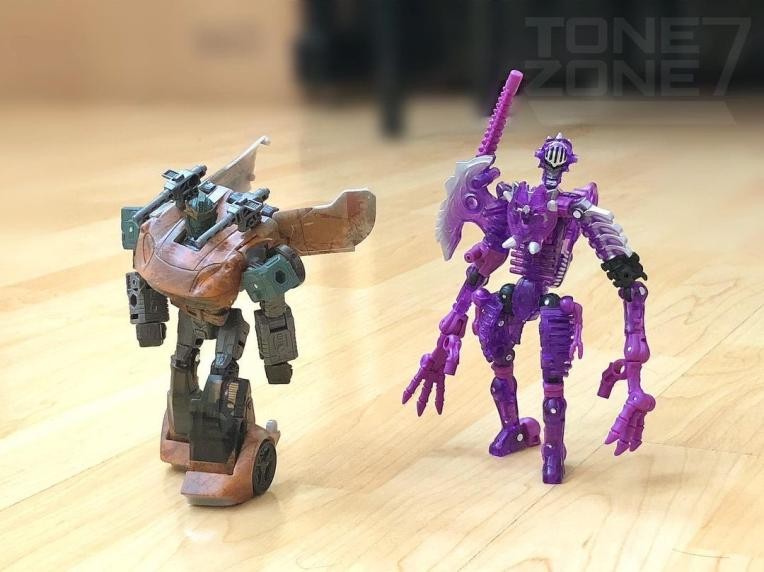 Transformers News: More Images of Netflix Barricade and Paleotrex redecos