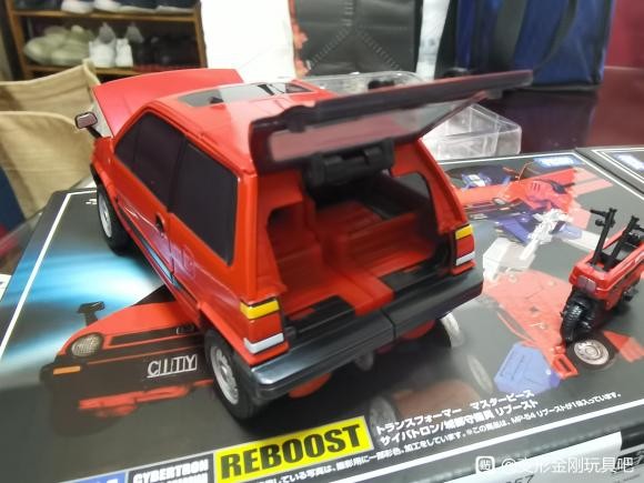 Transformers News: In Hand Images of Masterpiece Skids and Reboost along with