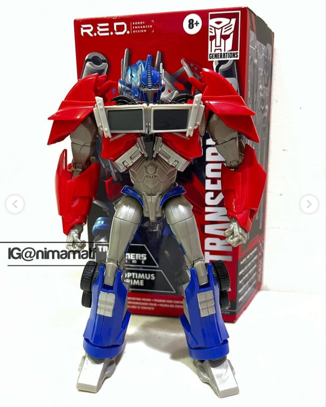 Transformers News: In Hand Images of RED Prime Optimus Prime Transformers News: In Hand Images of RED Prime Optimus Prime