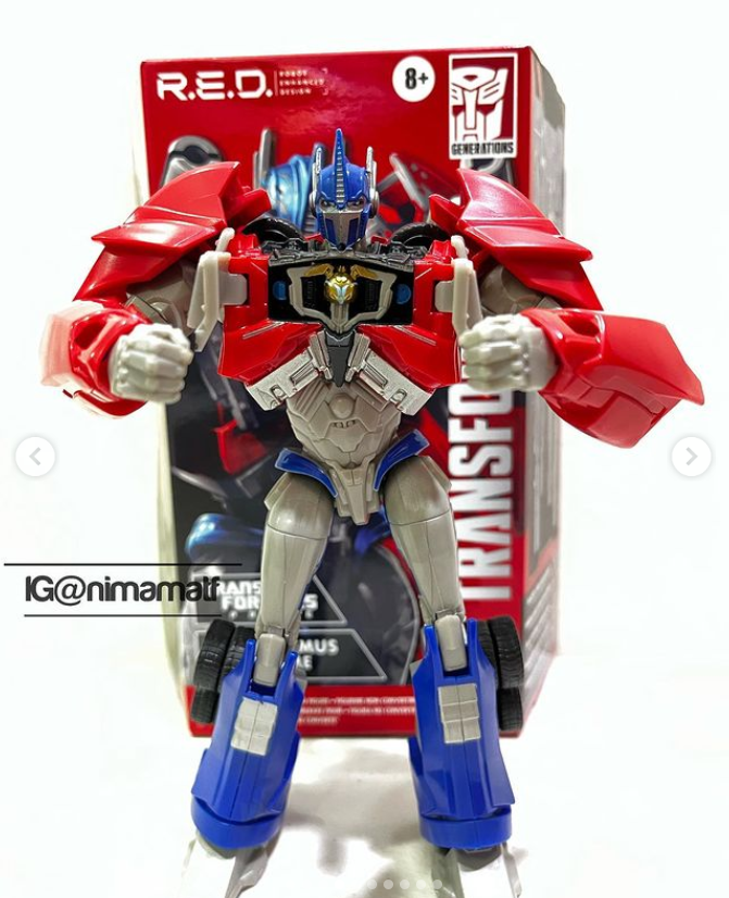 Transformers News: In Hand Images of RED Prime Optimus Prime Transformers News: In Hand Images of RED Prime Optimus Prime