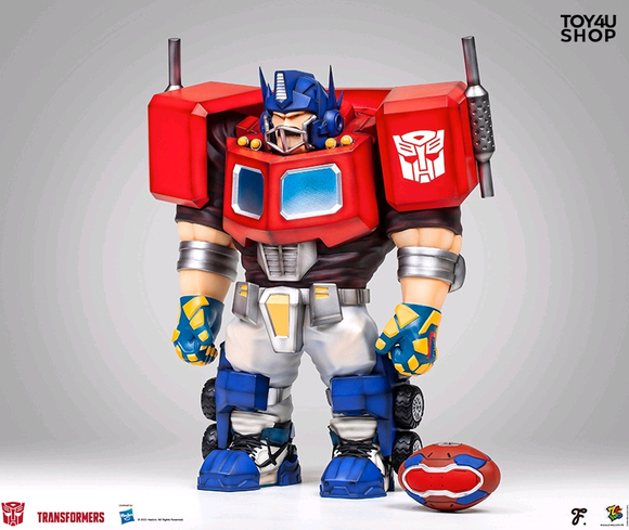 Transformers News: New $400 Statue of Optimus Prime as a Football Player Released Transformers News: New $400 Statue of Optimus Prime as a Football Player Released