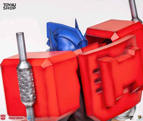 Transformers News: New $400 Statue of Optimus Prime as a Football Player Released Transformers News: New $400 Statue of Optimus Prime as a Football Player Released