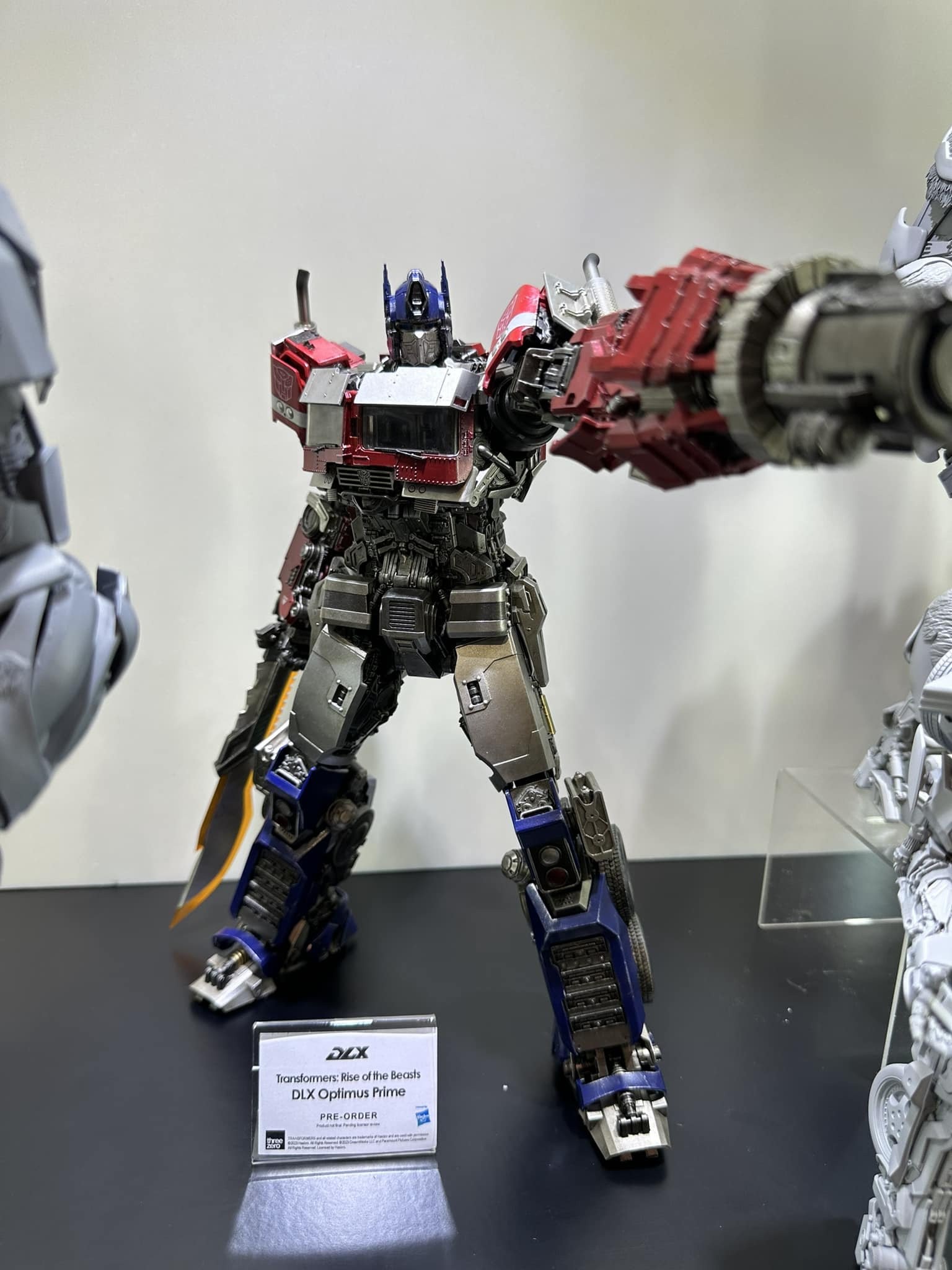 Transformers News: ThreeZero Reveals Gray Prototypes for DLX Scourge and Mirage